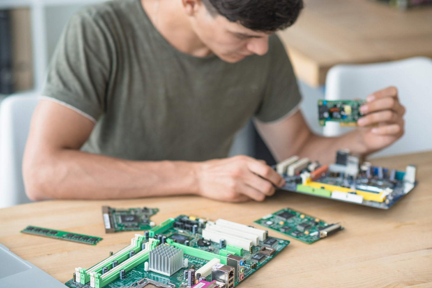 technician-assembling-the-motherboard-parts